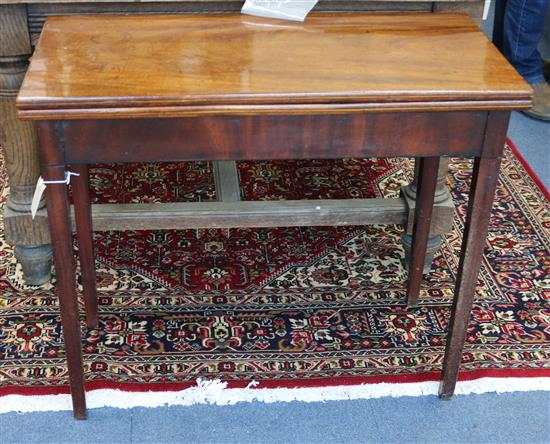 A George III mahogany tea table W.85cm